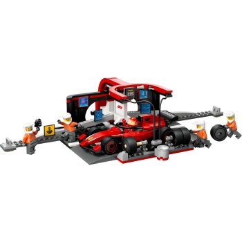 Boxa si mecanici F1 cu masina Ferrari